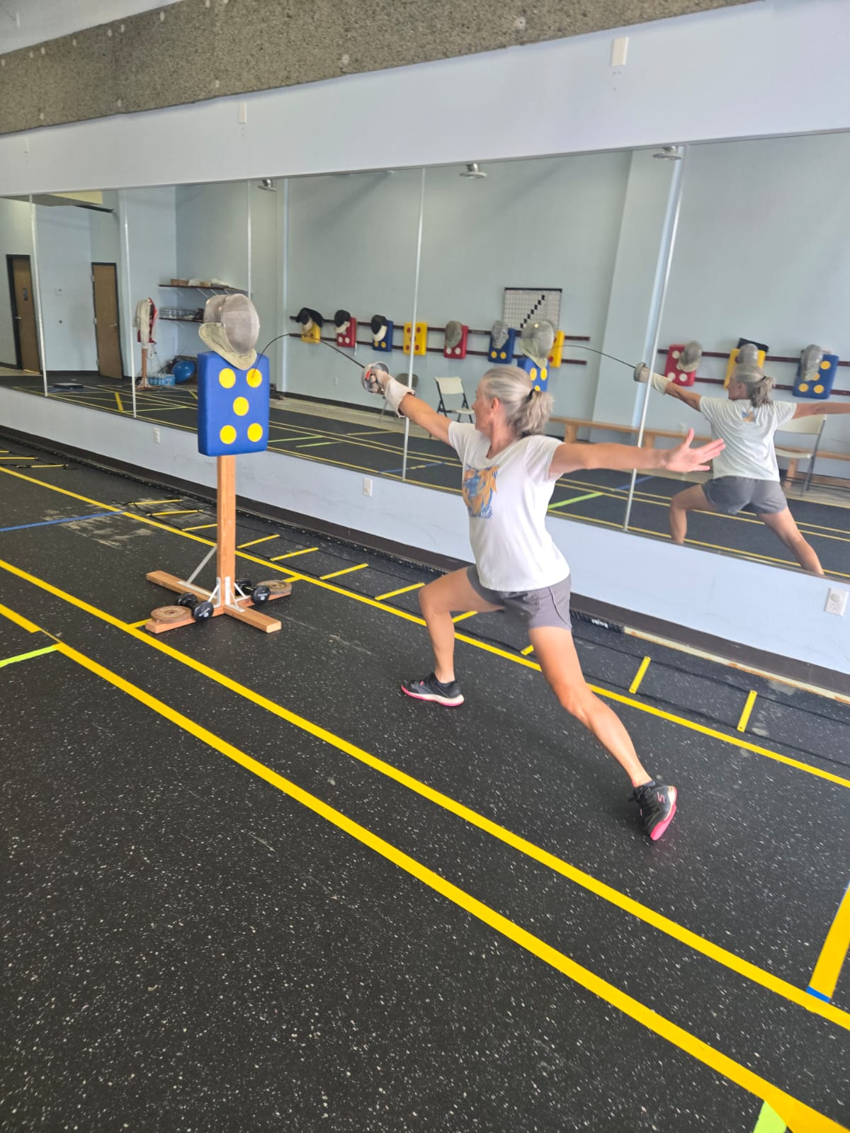 Adult fencer practicing lunges