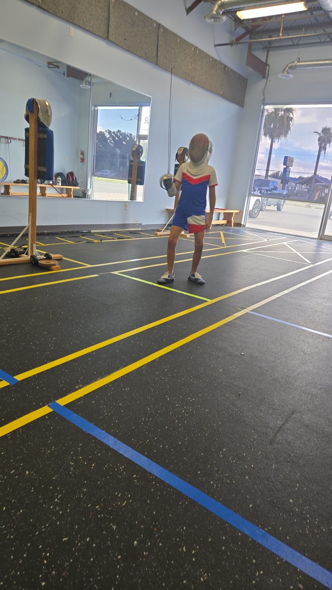 Young fencer on guard